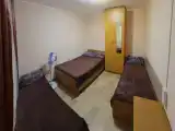 Четырехместный номер эконом-класса с общей ванной комнатой