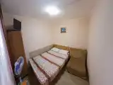 Трехместный номер эконом-класса с общей ванной комнатой