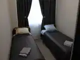 Односпальная кровать в общем номере