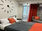 Трехместный номер с балконом
