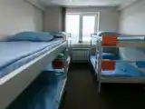 Кровать в 6-местном общем номере