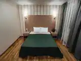 Четырехместный номер с собственной ванной комнатой вне номера