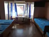 Четырехместный номер эконом-класса с общей ванной комнатой