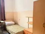 Односпальная кровать в общем номере