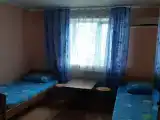 Трехместный номер с общей ванной комнатой