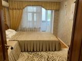 Трехместный номер с общей ванной комнатой